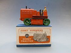 Dinky Supertoys diecast model Heavy Tractor with orange body and green tracks, 563, in original box.