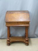 A 19thC inlaid escritoire with distinct Arts and Crafts/Art Nouveau marquetry to all sides and