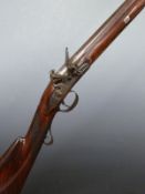 Muntz 16 bore flintlock hammer action gun with named and engraved lock, engraved hammer, top