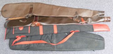 Four shotgun and rifle gun slips comprising one Browning, two faux leather and one with external