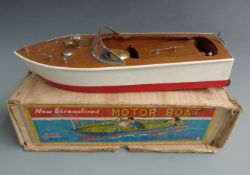 NBK battery operated New Streamlined Motorboat with painted body, 2S, in original box.