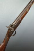Enfield pattern 16 bore percussion hammer action gun with chequered grip, steel trigger guard and