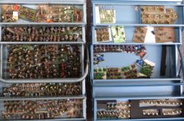 A very large collection of 25mm scale hand painted white metal war gaming soldiers.