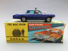 Corgi Toys diecast model The Man From UNCLE Gun Firing 'Thrush Buster' with purple body, lemon