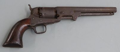 Colt London .38 six-shot single action revolver with shaped wooden grips and 7.5 inch indistinctly