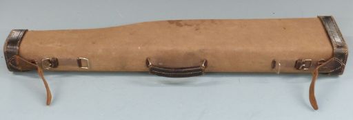 Leather and canvas leg of mutton gun case with fitted interior, 79cm long.