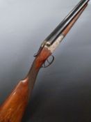A Mino Spanish 12 bore side by side shotgun with engraved scenes of birds to the lock, engraved
