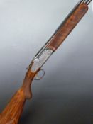 7307 Rizzini 28 bore over and under ejector shotgun with finely engraved lock, trigger guard, top