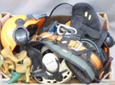 Tree surgeon's belt with carabiners, three helmets with ear defenders etc