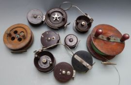 Ten fishing reels including Allcock Aerialite, Charles Alvey and a large mahogany and brass game