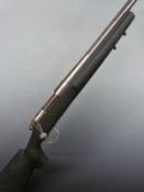 Remington Model 700 .22-250 bolt-action rifle with semi-pistol grip, sling suspension mounts and