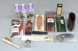 A collection of gun and shooting accessories including butt pads, suede waterproofing, Alkanet oil