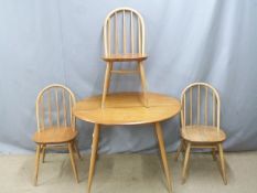 Ercol retro light elm table and three similar chairs, diameter 88 H74cm