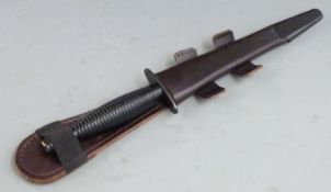 Fairbairn Sykes style fighting knife with ribbed hilt, 18cm blade and leather sheath