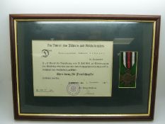 German WWI Cross of Honour with Swords medal, mounted and framed with certificate