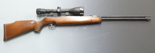 Weihrauch HW77 .177 air rifle with chequered semi-pistol grip, raised cheek piece to the stock,