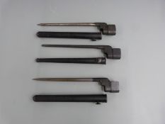 Three British No4 Mk2 spike bayonets with 20cm blades and scabbards