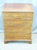 An inlaid ebony strung mahogany bachelor's chest of four graduated drawers, W61 D45 H77cm