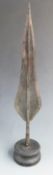 A 19thC African tribal spear mounted on turned stand, probably Kuba, Democratic Republic of Congo,