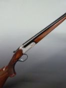 Yildiz.TSE 410 side by side shotgun with engraved lock, trigger guard, underside and top plate,