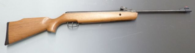 Perfecta Model 55 .22 air rifle with semi-pistol grip, raised cheek piece and adjustable sights,