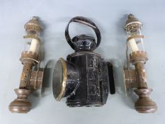 London Transport tri colour hand lamp, height 30cm and a pair of lamps marked GWR, height 37cm