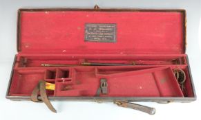 E J Churchill brass and leather bound side by side shotgun case with 'E. J. Churchill Practical Gun,