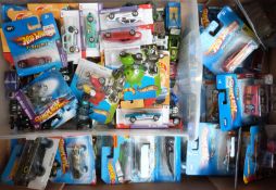 Over 80 Hot Wheels model vehicles, some in original boxes.