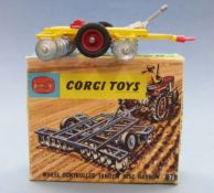 Corgi Toys diecast model Wheel Controlled Tandem Disc Harrow with yellow red and silver body, 71, in