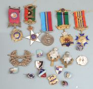 A small collection of badges/jewels including Freemasons/ RAOB examples, three being enamel and