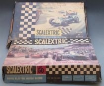 Two Tri-ang Scalextric model motor racing sets 33 and 50, both in original boxes.