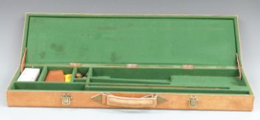 Brown leather shotgun case with fitted interior, gun slip and cleaning kit, 79x23x9cm