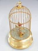 20thC singing birds automata with two birds in gilt metal cage, H28cm