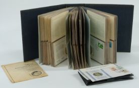 International Society of Postmasters album of over 30 stamp and coin covers