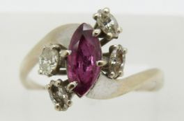 An 18ct white gold ring set with a marquise cut ruby and diamonds, in Martin & Co box, 3.1g, size O
