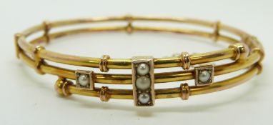 Victorian 9ct gold bangle set with seed pearls, 7.2g