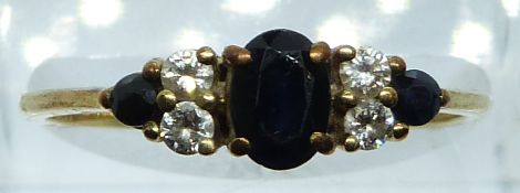A 9ct gold ring set with sapphires and diamonds, 1.6g, size R