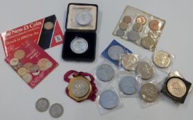 Two silver 1968 Mexico Olympics 25 Pesos coins, one in a mount and cased, together with a collection