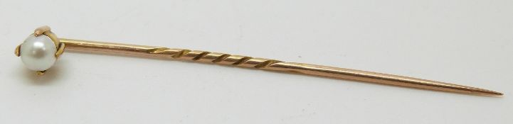 Edwardian yellow metal stick pin set with a pearl, in original box