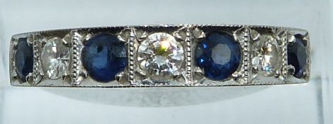 An 18ct gold half eternity ring set with sapphires and diamonds, each approximately 0.15ct, 4.9g,