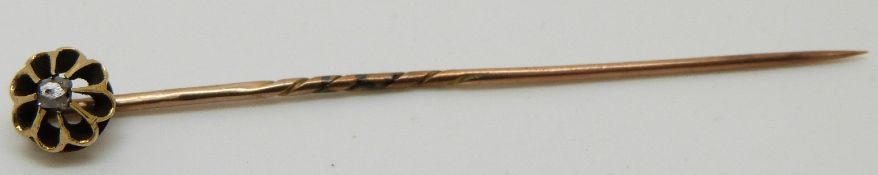 Victorian yellow metal stick pin set with a rose cut diamond