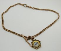 A 9ct rose gold pocket watch chain/ Albert and a 9ct rose gold compass charm, 23.5g