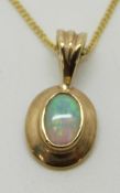 A 9ct gold necklace set with an opal, 1.5g
