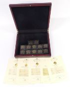 London Mint Office 'Fabula Aurum' collection comprising 12 boxed 2009 9ct gold coins, each 1g, in