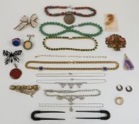 A collection of jewellery including a silver and coral necklace, diamanté necklaces, Butler & Wilson