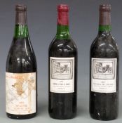 Three bottles of French red wine. Chateau Le Tour St Bonnet Bordeaux 1976, 700ml. Domaine De L'