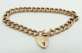 A 9ct rose gold curb link bracelet and padlock, 10.6g
