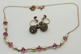 A 9ct gold necklace and a pair of 9ct gold and silver earrings set with paste