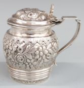 Continental white metal mustard with embossed decoration, possibly Austrian together with a French