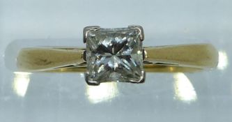 An 18ct gold ring set with a princess cut diamond of approximately 0.8ct, 3.7g, size M